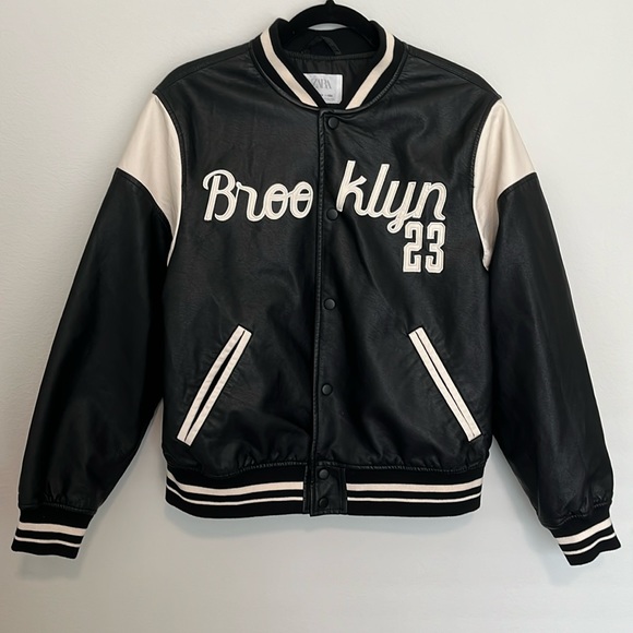 Zara jersey jacket, in a black and tan color. The size is a 13-14 (size small). - Picture 5 of 7